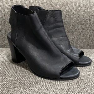 Open toe black booties with small chunky heel